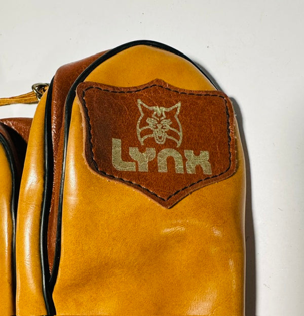 Close-up of the Lynx leather brand patch with the lynx cat-head logo - Alternate View