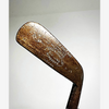 Head of the W. Gibson jigger showing the anchor cleek mark and Kinghorn Scotland stamping, hickory golf