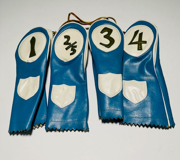 Vintage light blue vinyl golf headcover set of four numbered 1, 2/5, 3 and 4 with white shields