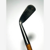Face view of the Akros jigger showing punched dot scoring, hickory golf iron