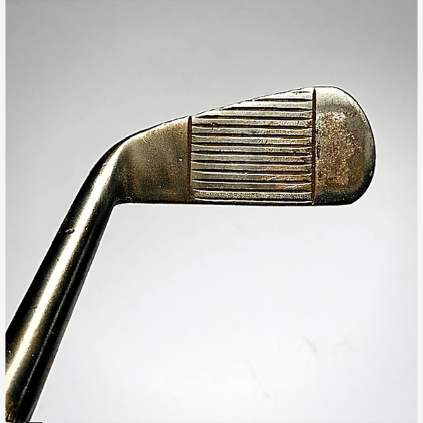 Harry Vardon Spalding iron face with period scoring lines, hickory golf