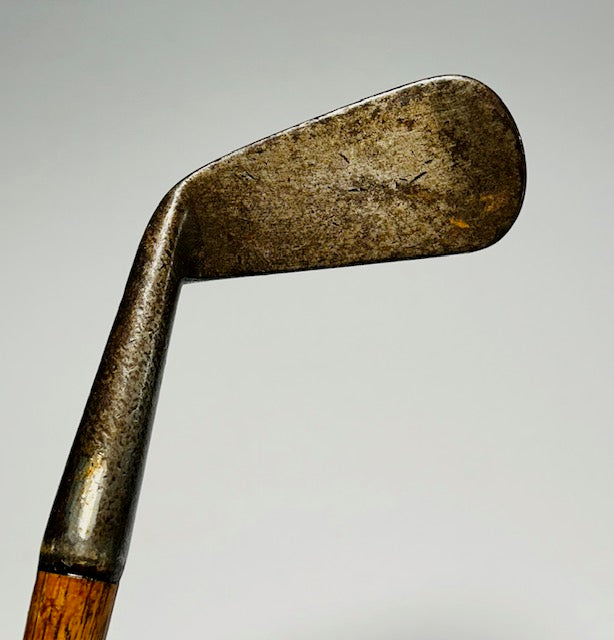Smooth-face lofter head with faint scoring and original hosel