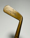 Lakewood maker stamp on the brass-head hickory putter