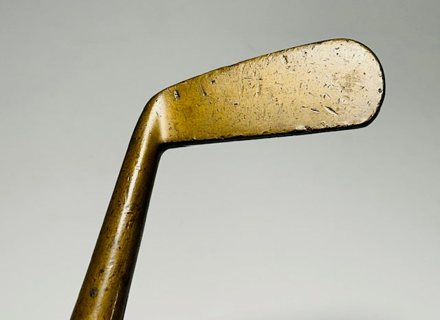 Brass-head Lakewood putter blade face, smooth and play-ready