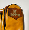 Close-up of the Lynx leather brand patch with the lynx cat-head logo