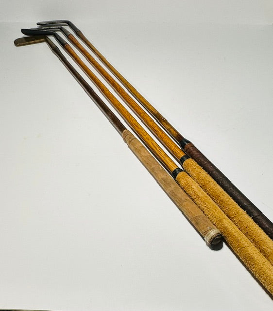 Full-length view of the four hickory shafts and original suede and leather grips - Alternate View