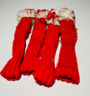 Back view of the red knit pom-pom headcover set showing condition