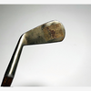Smooth unscored face of the Spalding Crescent hickory golf mid-iron at address
