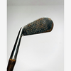 Dot punch face of the Spalding thistle hickory golf mid-iron at address