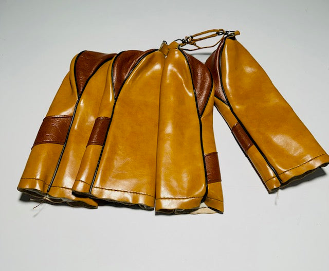 Back view of the Lynx four-piece leather headcover set showing condition