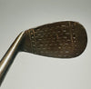 MacGregor Popular mashie-niblick hickory golf face with dot-punch scoring at address