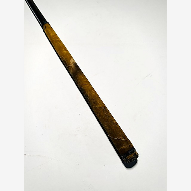 Tan leather wrap grip on the Spalding thistle mark vintage hickory golf iron