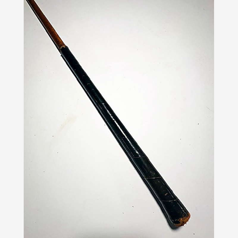 Black leather grip and hickory shaft of the Panther by Kroydon mashie, hickory golf