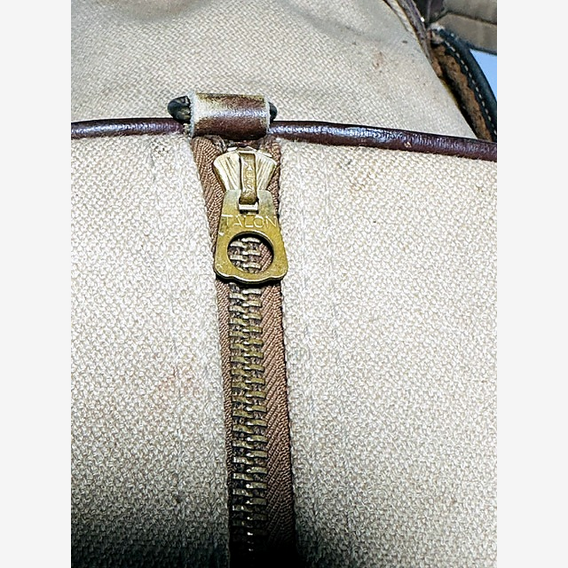 Talon zipper closeup on vintage canvas golf bag