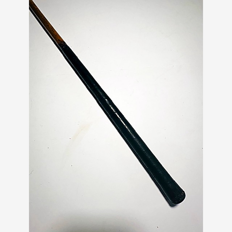 Black leather grip and hickory shaft of the Jerry Travers Schenectady putter, hickory golf