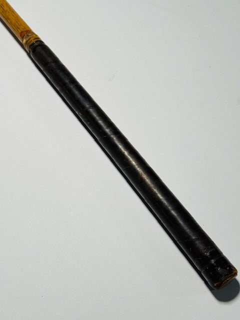 Thomas E. Wilson mid iron black leather wrap grip