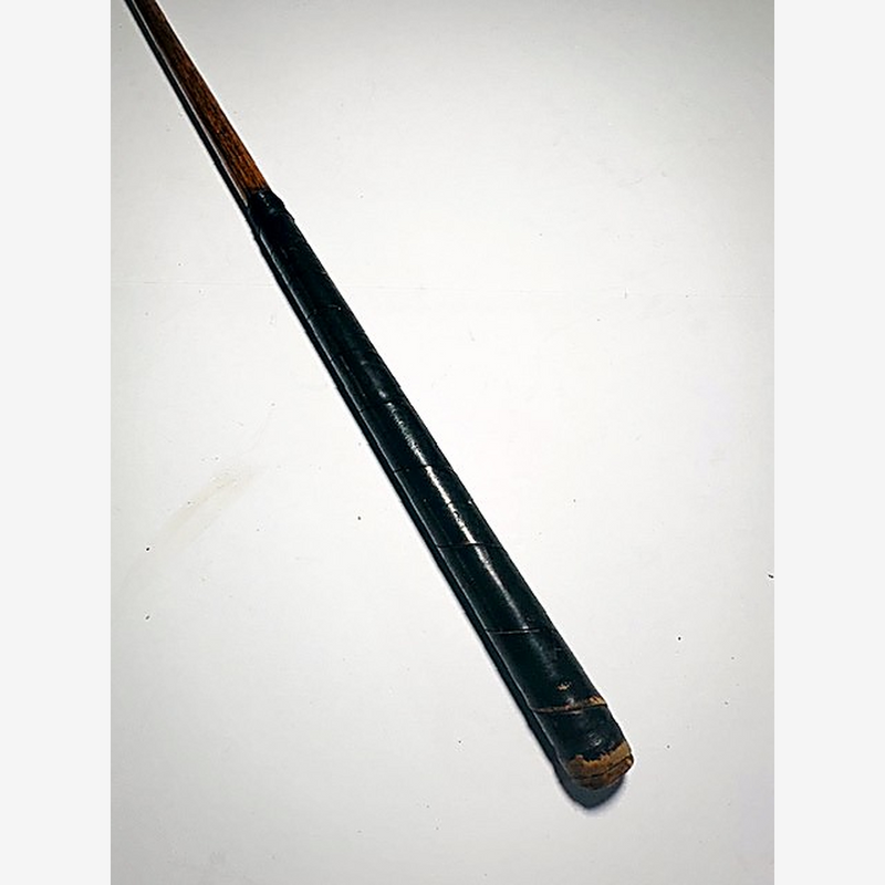 Black leather grip and hickory shaft of the Wright & Ditson mallet putter, hickory golf