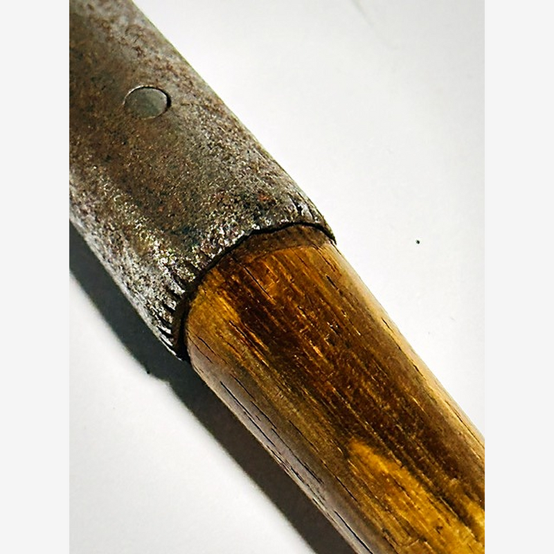 Hosel and shaft junction of the J. Gourlay hickory golf putter showing the pin hole where the head needs re-pinning