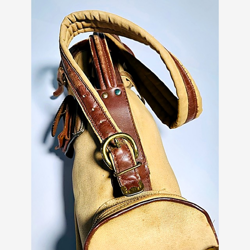 Leather handle and brass buckle on vintage golf bag