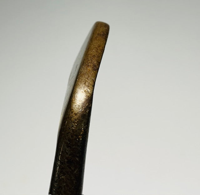 Hosel and back-edge profile of a vintage hickory iron head